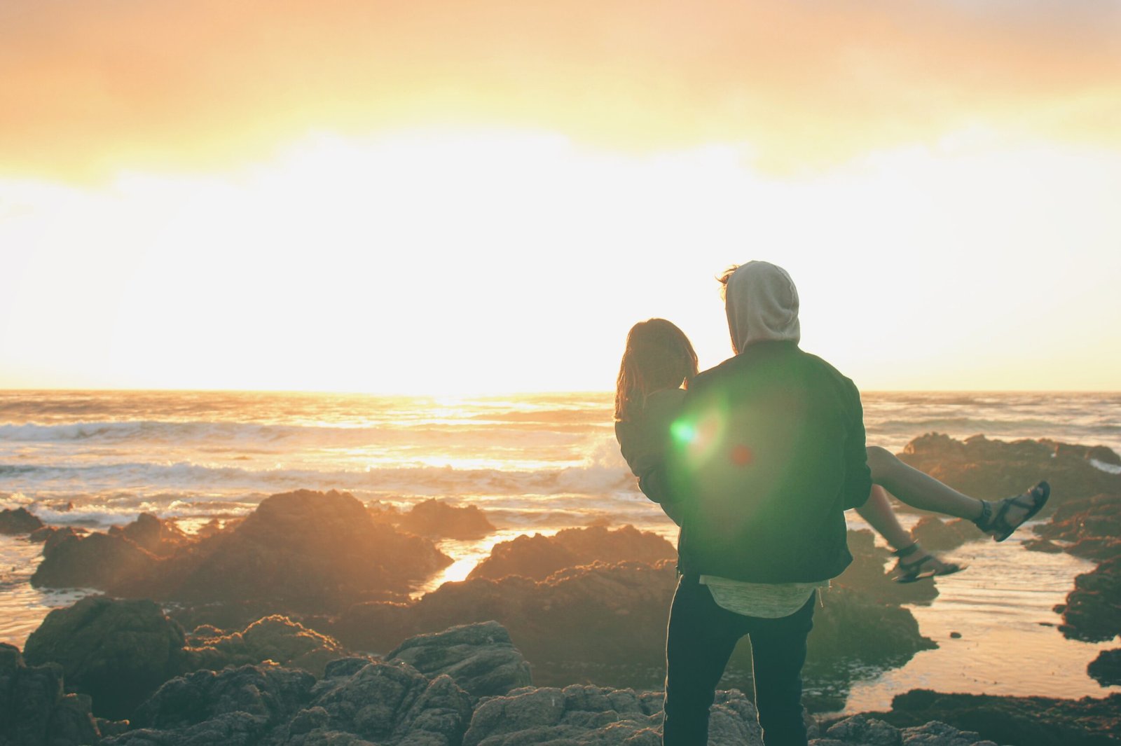 Couple in Carmel-by-the-Sea on a date at sunset