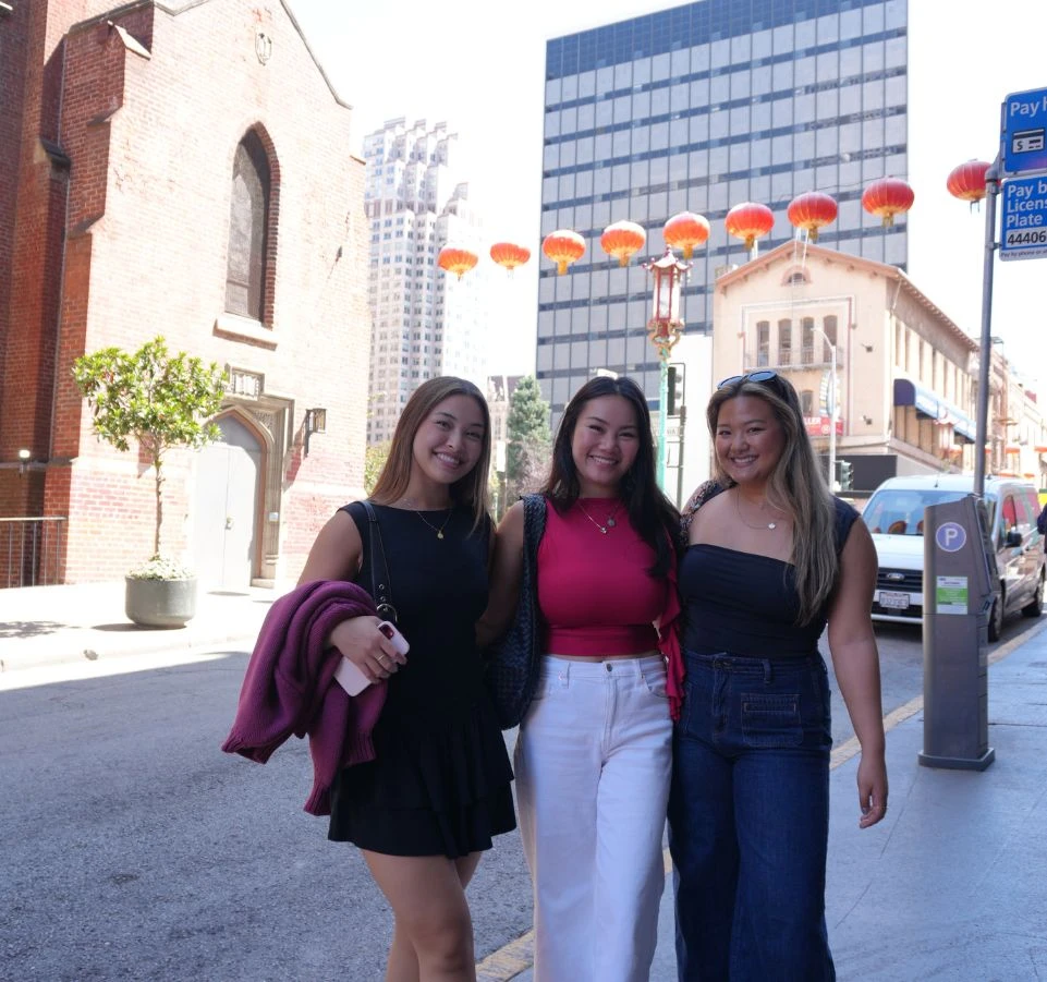 SF Chinatown tour group photo with lanterns backdrop